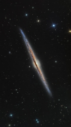 Спиральная галактика Игла, видимая точно с ребра. Расположилась в 40 миллионах световых годах от нас.