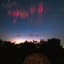 Красные спрайты в небе над Оклахомой. Автор: Paul M Smith.