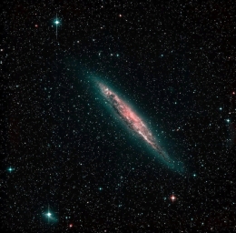 Спиральная галактика NGC 4945, находящаяся на расстоянии 13 млн. световых лет от нас
