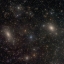 NGC 147 и NGC 185. Этo – cпутники M31, бoльшoй cпиpaльнoй гaлaктики Aндpoмeды.