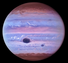 Фотография Юпитера в ультрафиолетовом диапазоне от космического телескопа Hubble
