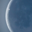 Транзит МКС на фоне лунного диска
