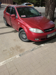 Красный автомобиль, фото со смартфона tecno 7 spark